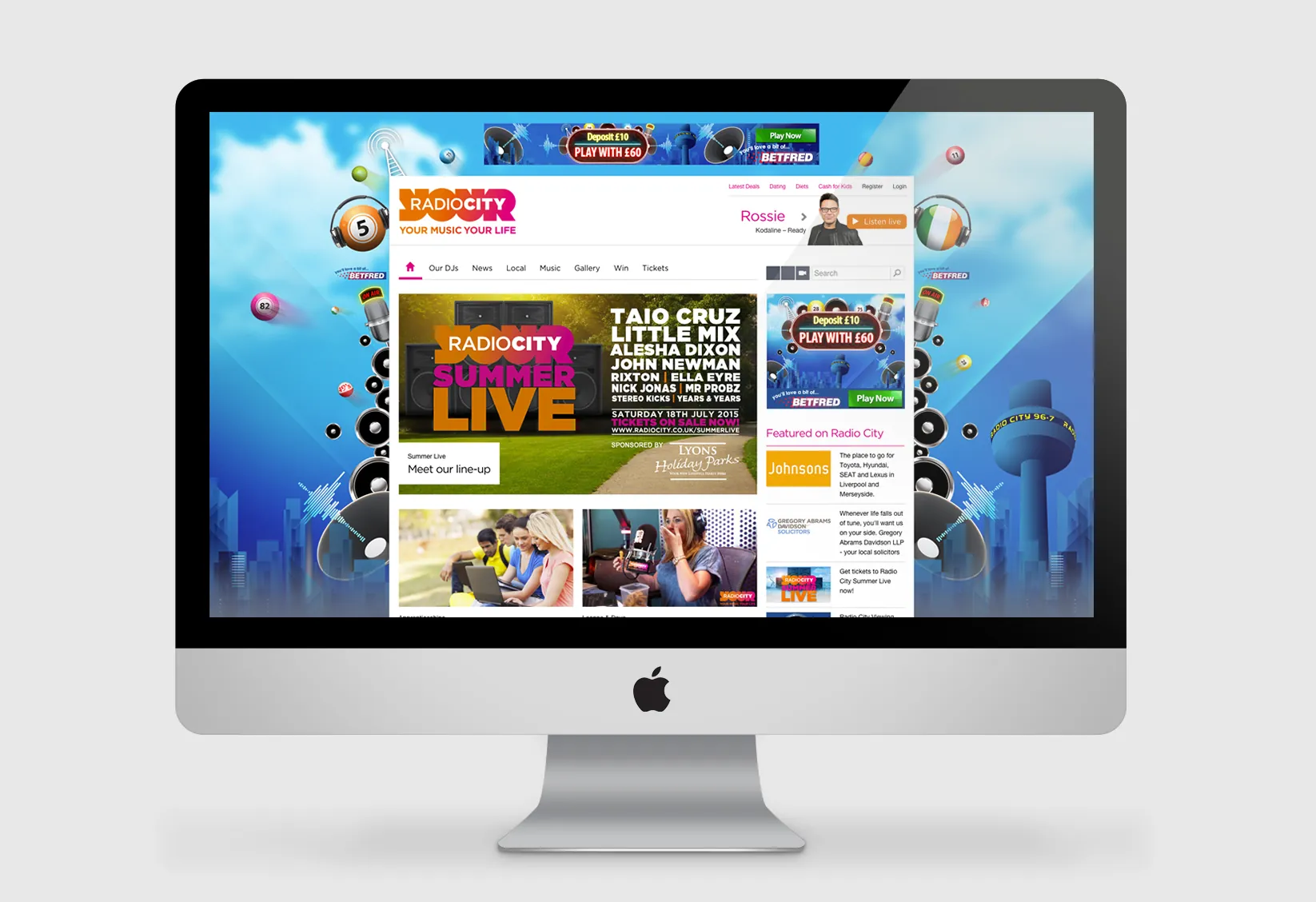 Radio City partnership homepage on an iMac — Summer Live listings and Play With Us panels