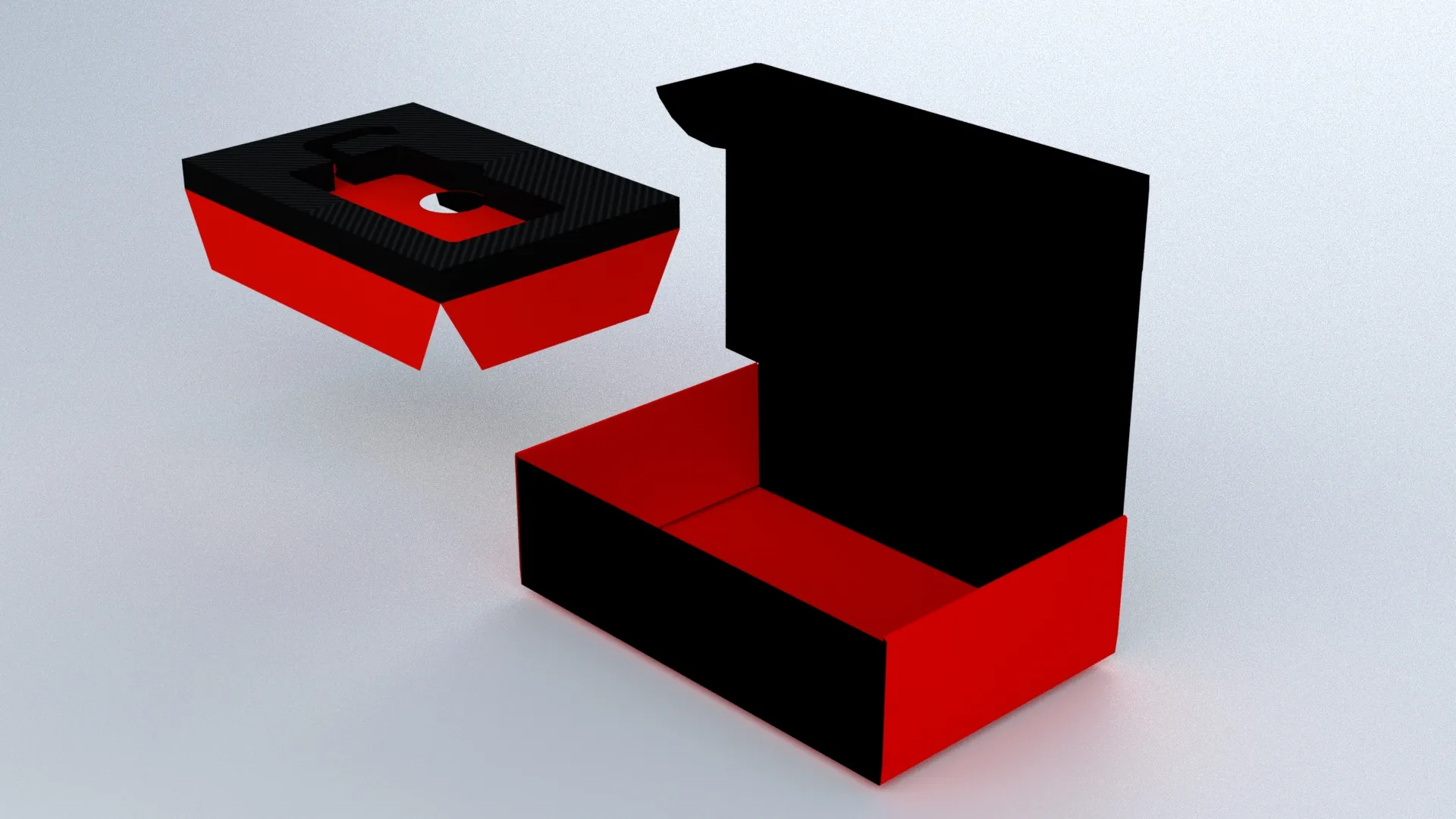 Stealth Trak packaging, V3 — the red foam insert lifted clear of the opened box